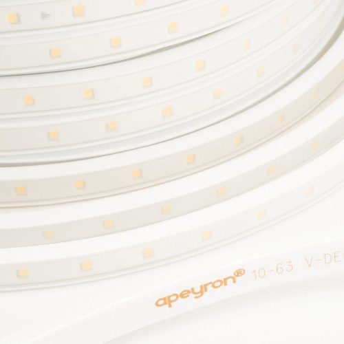 Светодиодная влагозащищенная лента Apeyron 6W/m 60LED/m 2835SMD теплый белый 25M 10-56 Светодиодная влагозащищенная лента Apeyron 6W/m 60LED/m 2835SMD теплый белый 25M 10-56